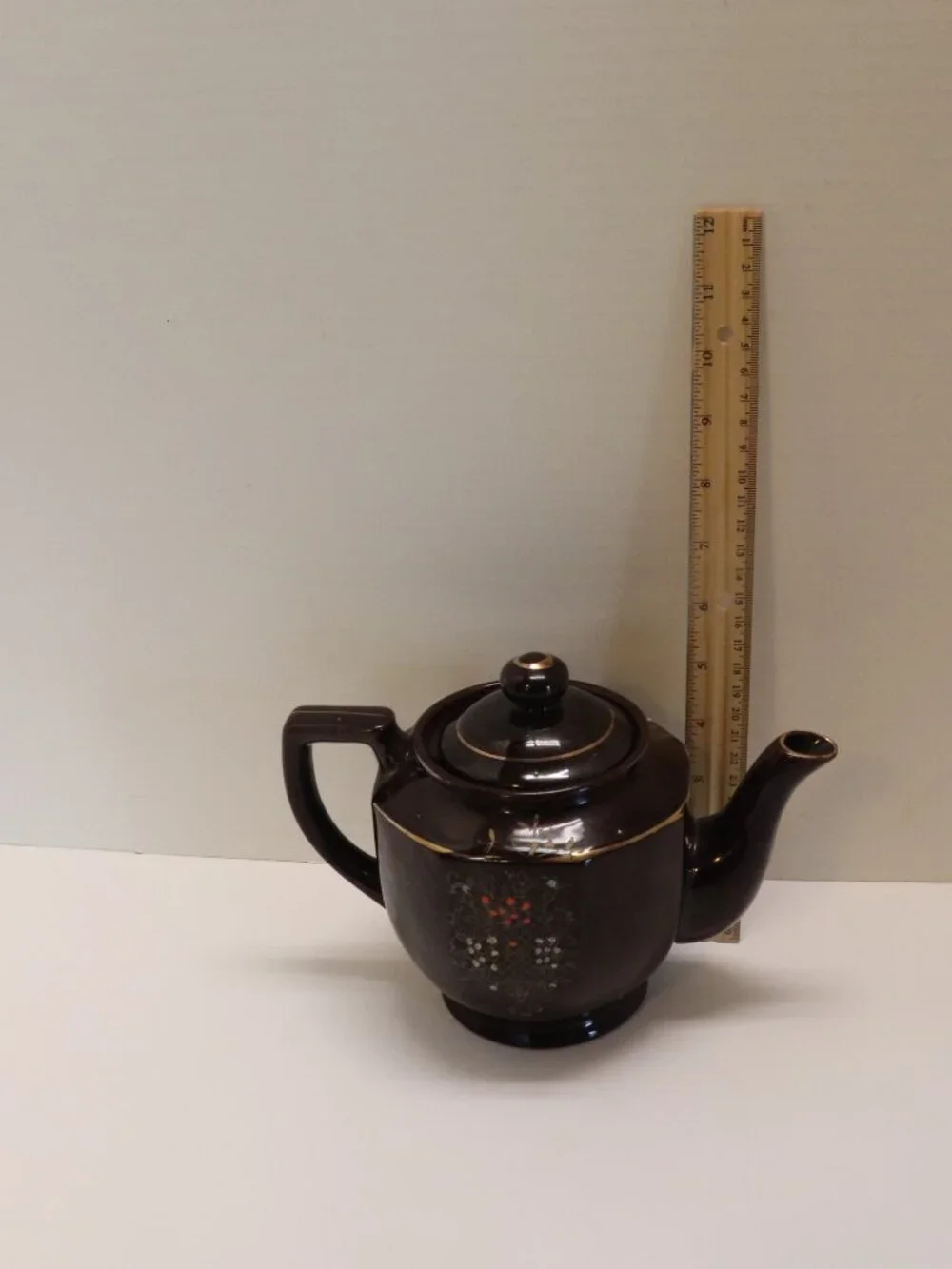 A Porcelain Pitcher made in Japan with Japan Written on Bottom Black